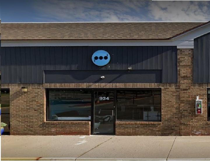 The Pod Escape Room storefront at 934 Elmwood Rd, Lansing